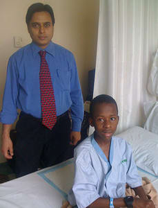 Dr Mahendra Jain- urologist-bangalore- with patient